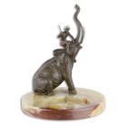 #AN ONYX ASHTRAY MOUNTED WITH A BRONZE ELEPHANT WITH RIDER