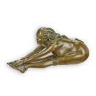 Bronzefigur weiblicher Akt, A BRONZE SCULPTURE OF A STRETCHING NUDE