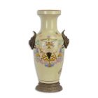Porzellanvase mit Messingfuß, A PORCELAIN VASE ON BRASS STAND