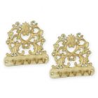 2er-Set Hakenleisten für Schlüssel aus Gusseisen, A PAIR OF CAST IRON KEY-HOLDERS