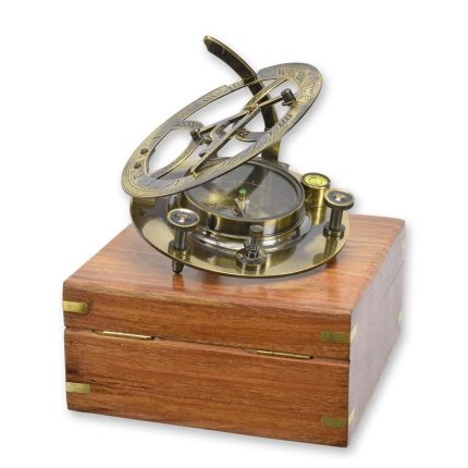 A BRASS COMPASS IN WOODEN BOX