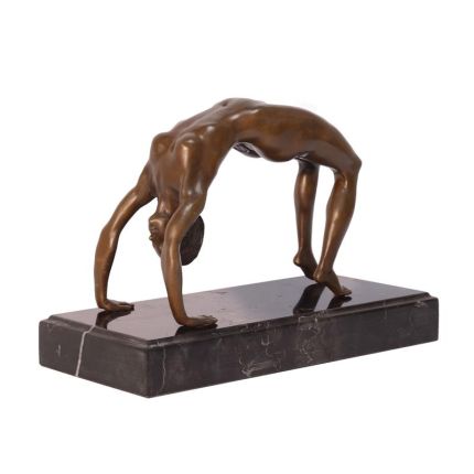 #A BRONZE SCULPTURE OF A FEMALE CONTORTIONIST