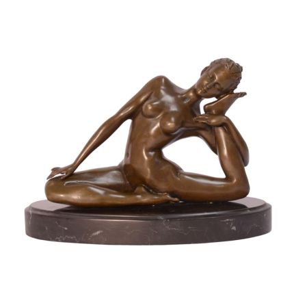 #A BRONZE SCULPTURE OF A FEMALE CONTORTIONIST