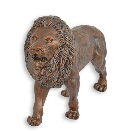 A BRONZE SCULPTURE OF A LION