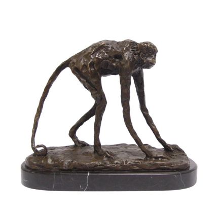 #A BRONZE SCULPTURE OF A SPIDER MONKEY