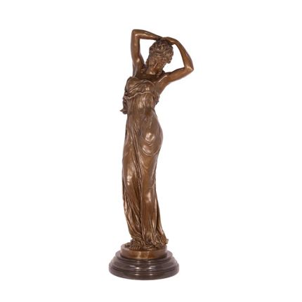 #A BRONZE SCULPTURE OF A WOMAN