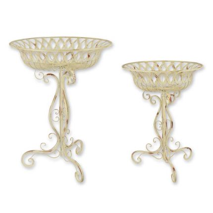 A PAIR OF IRON PLANTERS ON STAND