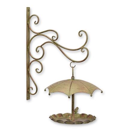 A WALL MOUNT IRON BIRD FEEDER