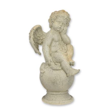 AN MGO SCULPTURE OF A PUTTO