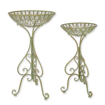 AN IRON PAIR OF FLOWER BASKETS ON STAND