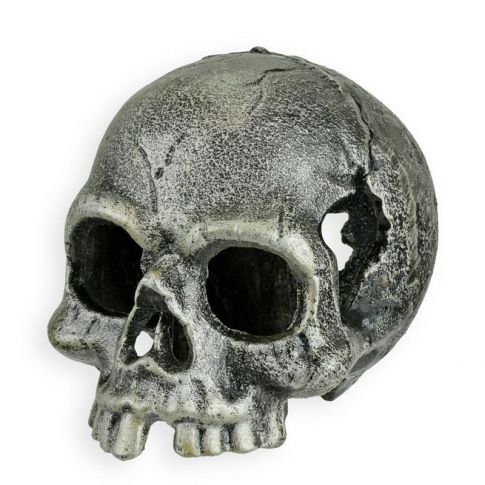 Teelichthalter in Sch&auml;delform aus Gusseisen, A CAST IRON SKULL TEA LIGHT HOLDER