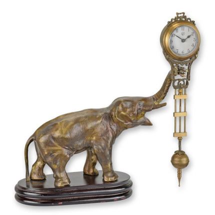 Tischuhr mit Elefantenfigur, A TABLE CLOCK MYSTERIEUSE HELT BY AN ELEPHANT