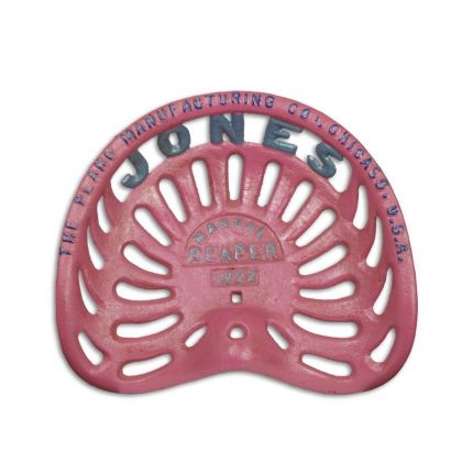 Traktorsitz aus Gusseisen, A CAST IRON TRACTOR SEAT "THE PLANO MFG CO. CHICAGO"